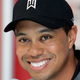 Illustration for article titled Hey, Heres A Photo Of Tiger Woods Without His Fake Front Tooth (Yes)
